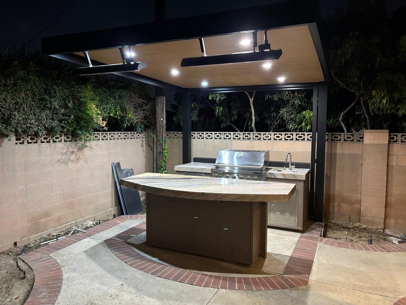 4K cantilever aluminum patio cover — over an outdoor kitchen
