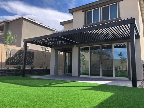 4K black louvered patio cover over a turf backyard