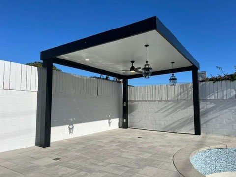 Freestanding insulated cover with pendant lanterns by the pool