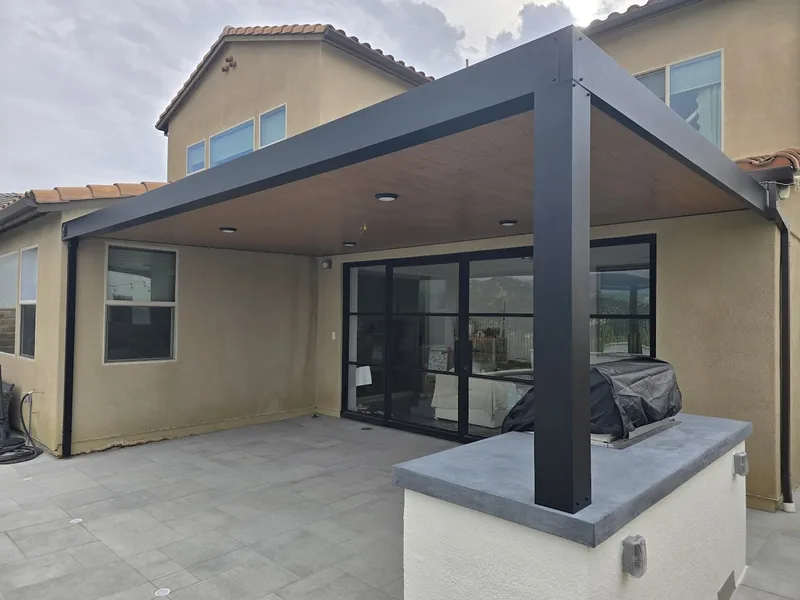Attached 4K frame in espresso with 3-inch Western Cedar insulated panels and four recessed lights